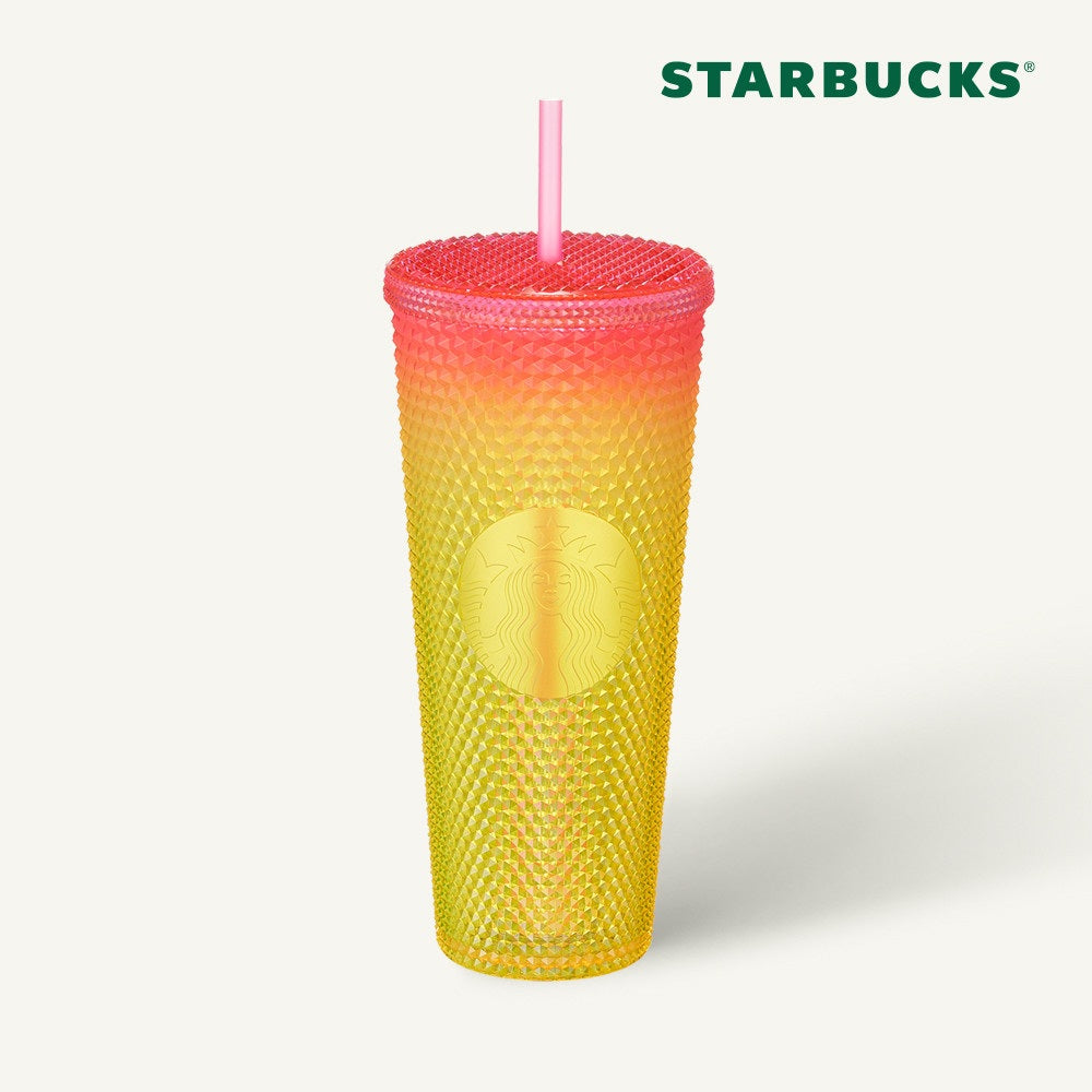 Pink starbucks cup with yellow straws